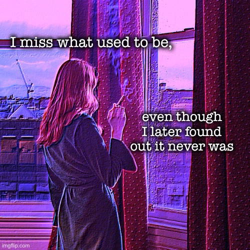 A woman with long hair, seen from behind in a robe, stands smoking at a tall window with red curtains, in a purple and pink tinted photo. Text at top left: "I miss what used to be," Text at right: "even though I later found out it never was"